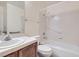 Simple bathroom featuring a single sink vanity, white tile countertop, and a shower over the tub at 6417 Plumcrest Rd, Las Vegas, NV 89108