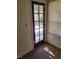 Bedroom door leading to an outdoor patio with privacy lattice and abundant natural light at 6417 Plumcrest Rd, Las Vegas, NV 89108