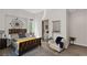 Bright bedroom featuring unique wall decor and neutral finishes at 668 Falcon Summit Ct, Henderson, NV 89012