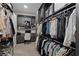 Large walk-in closet with custom shelving, ample storage, and a dedicated desk area at 668 Falcon Summit Ct, Henderson, NV 89012
