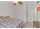 Neutral bedroom with a ceiling fan, natural light, and closet space at 6814 Willowcroft St, Las Vegas, NV 89149
