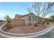Side view of a charming single-story home with a well-maintained yard and privacy wall at 6814 Willowcroft St, Las Vegas, NV 89149