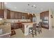 Well-appointed kitchen with granite counters, a center island, and stainless steel appliances at 6814 Willowcroft St, Las Vegas, NV 89149