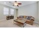 Cozy living room with natural light, comfortable seating, and ample space for storage at 6814 Willowcroft St, Las Vegas, NV 89149