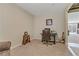 Bright office space with carpeted floors and natural light from the windows at 6814 Willowcroft St, Las Vegas, NV 89149