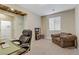 Spacious office with cozy chair and window providing natural light at 6814 Willowcroft St, Las Vegas, NV 89149