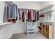 Spacious walk-in closet features custom shelving, hanging rods, and ample storage for shoes and accessories at 6814 Willowcroft St, Las Vegas, NV 89149