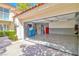 Spacious two-car garage with ample storage, shelving, and modern appliances at 6925 Emerald Springs Ln, Las Vegas, NV 89113