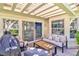 Relaxing patio with a pergola, comfortable seating, and a grill, perfect for outdoor entertaining at 6925 Emerald Springs Ln, Las Vegas, NV 89113