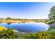 Picturesque water view of the community lake highlighting the well-manicured golf course in the background at 6925 Emerald Springs Ln, Las Vegas, NV 89113