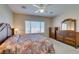 Spacious bedroom with a large window and matching furniture at 7649 Broadwing Dr, North Las Vegas, NV 89084
