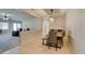 Dining room with stylish lighting and a seamless transition to the living room at 7649 Broadwing Dr, North Las Vegas, NV 89084