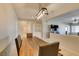 Open concept view from the dining area, featuring built-in shelving and adjacent living area at 7649 Broadwing Dr, North Las Vegas, NV 89084