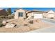 Charming single story home with a two car garage and low maintenance landscaping at 7649 Broadwing Dr, North Las Vegas, NV 89084