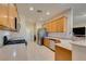 Spacious kitchen with stainless steel appliances, granite countertops, and ample cabinet space at 7649 Broadwing Dr, North Las Vegas, NV 89084