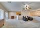 Open-concept living area connecting to the kitchen, featuring modern furnishings and plenty of natural light at 7649 Broadwing Dr, North Las Vegas, NV 89084