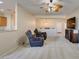 Inviting living area with comfortable seating, an entertainment center, and open access to other spaces at 7649 Broadwing Dr, North Las Vegas, NV 89084