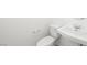Simple bathroom with white pedestal sink and toilet at 77 Tardando Ave, Henderson, NV 89015