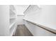 Spacious walk-in closet with white shelving providing ample storage at 77 Tardando Ave, Henderson, NV 89015