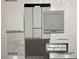 Selection board showcasing modern design elements, including quartz countertops, gray cabinets, and drift wood flooring at 77 Tardando St, Henderson, NV 89015
