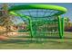 A fun, unique green climbing structure found in one of the neighborhood's parks and play areas at 77 Tardando St, Henderson, NV 89015