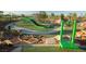 Community playground featuring modern play structures and landscaping at 77 Tardando St, Henderson, NV 89015