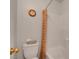 Bathroom featuring a toilet and a shower/tub combo with an orange shower curtain at 7721 Sour Gum Ct, Las Vegas, NV 89131