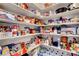 Spacious pantry with ample shelving, perfect for organized storage in the kitchen area at 7721 Sour Gum Ct, Las Vegas, NV 89131