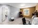 Neutral-toned bedroom with a window, carpet, and simple furnishings at 7769 Peaceful Trellis Dr, Las Vegas, NV 89179