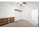 Bedroom featuring carpet, a ceiling fan, and a dresser at 7916 Nesting Pine Pl, Las Vegas, NV 89143