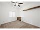 Bedroom featuring carpet, a floating shelf, and a dresser at 7916 Nesting Pine Pl, Las Vegas, NV 89143
