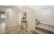 Entryway with tiled floors, staircase, and a decorative table with a plant at 7916 Nesting Pine Pl, Las Vegas, NV 89143