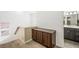 Hallway featuring built in cabinets and access to the bathroom at 7916 Nesting Pine Pl, Las Vegas, NV 89143