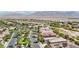 Panoramic aerial view of a residential neighborhood with mountain views in the distance at 8316 Imperial Lakes St, Las Vegas, NV 89131