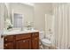 A well-maintained bathroom features a single sink vanity, toilet, and shower-tub combo at 8316 Imperial Lakes St, Las Vegas, NV 89131