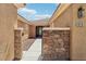 Inviting home entrance with stone accents, and a clear view of the front door at 8316 Imperial Lakes St, Las Vegas, NV 89131