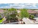 Charming home with mature landscaping, a driveway, and a covered porch providing shade and curb appeal at 8316 Imperial Lakes St, Las Vegas, NV 89131