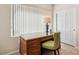 Well-lit home office with a functional desk setup and a peaceful ambiance at 8316 Imperial Lakes St, Las Vegas, NV 89131