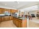 Spacious kitchen with granite countertops, stainless steel appliances, and a large island for food preparation at 8316 Imperial Lakes St, Las Vegas, NV 89131