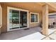 A covered patio offers a shaded retreat, showcasing a seamless blend of indoor-outdoor living at 8316 Imperial Lakes St, Las Vegas, NV 89131