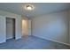 Clean bedroom showcasing a closet and an open door to another space at 8324 S Miller Ln, Las Vegas, NV 89113