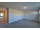 This bonus room features neutral walls, carpeted floors, and a large open space at 8324 S Miller Ln, Las Vegas, NV 89113