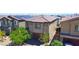 Beautiful two-story home featuring a tile roof, solar panels, and a spacious two-car garage at 8324 S Miller Ln, Las Vegas, NV 89113
