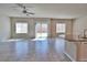 Open concept living space featuring recessed lighting, fan and an open kitchen at 8324 S Miller Ln, Las Vegas, NV 89113