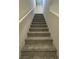 Carpeted staircase leads to the upper level of the home at 8324 S Miller Ln, Las Vegas, NV 89113