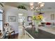Comfortable dining area open to the kitchen, perfect for Gathering meals and casual entertaining at 8808 Litchfield Ave, Las Vegas, NV 89134