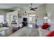 Inviting living room with vaulted ceiling, hardwood floors, and neutral paint for a cozy atmosphere at 8808 Litchfield Ave, Las Vegas, NV 89134