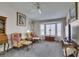 Comfortable living room featuring plush armchairs, and a bay window at 8808 Litchfield Ave, Las Vegas, NV 89134