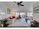Bright living room featuring a neutral color scheme, dark wood floors, and natural light at 8808 Litchfield Ave, Las Vegas, NV 89134
