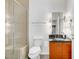 Bathroom features walk in shower, modern lighting, granite countertops and updated vanity at 900 Las Vegas Blvd # 1014, Las Vegas, NV 89101